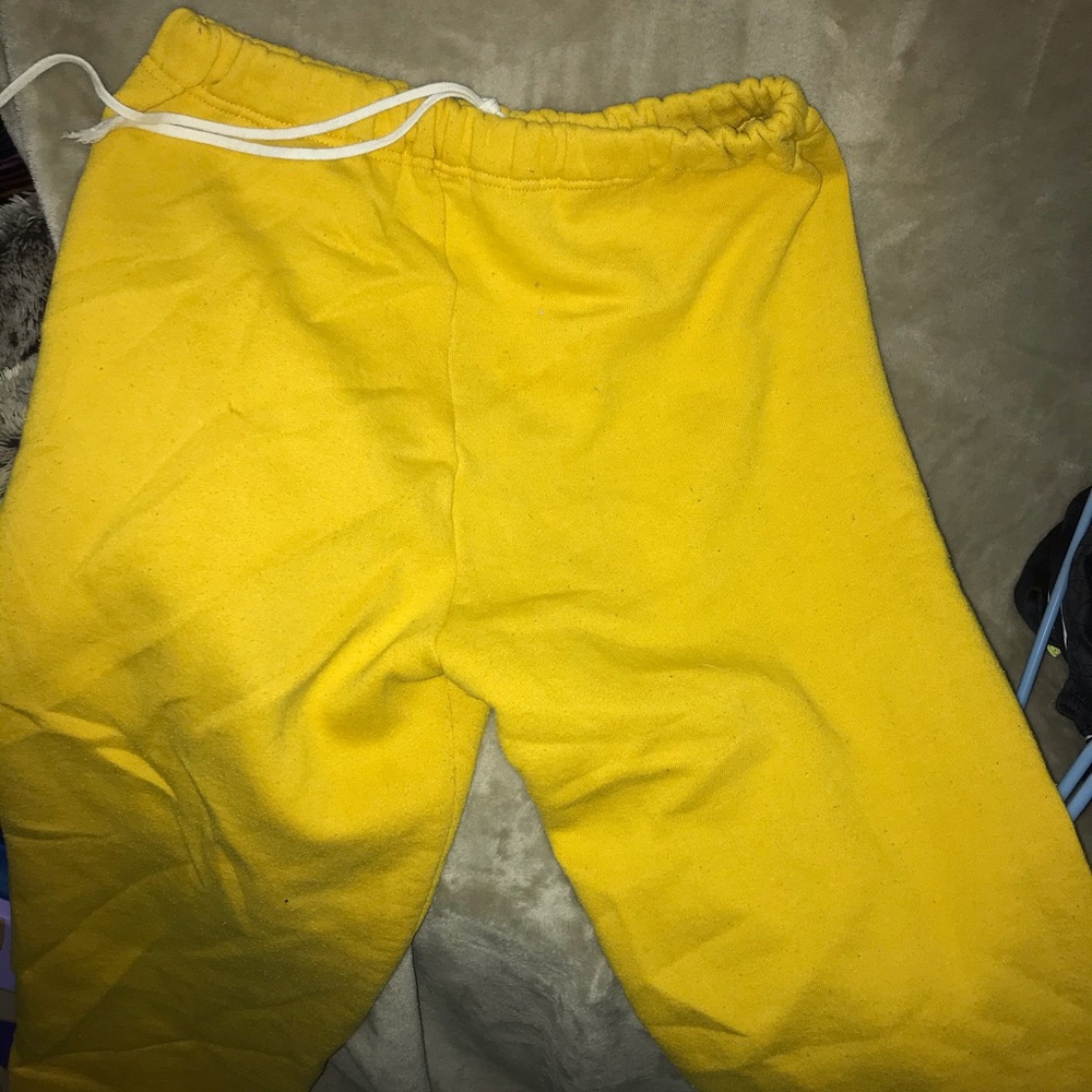 Yellow thick sweatpants.